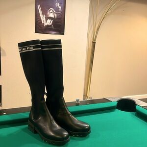 Miu miu boots! Never worn. A gift from my mother in law that’s too high end.